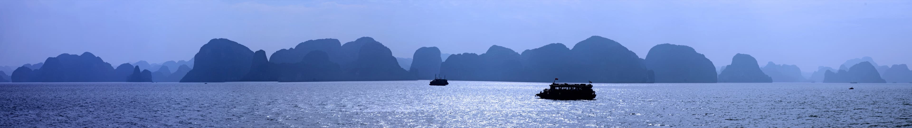 A panoramic view of limestone islands across Hạ Long Bay